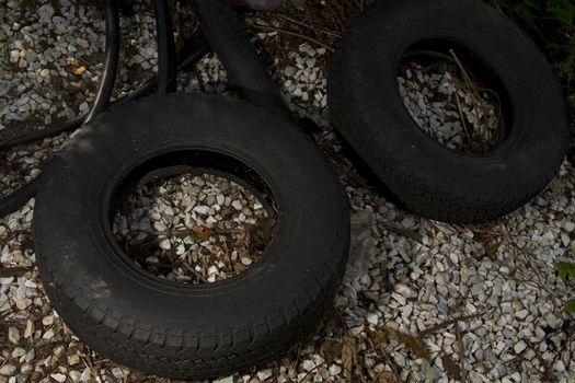 two tires throw out in nature