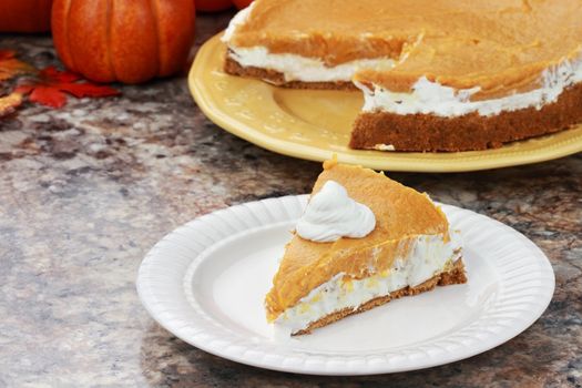 Double Layer No Bake Pumpkin Pie made with pumpkin, vanilla pudding,cream cheese, and whipped cream. 