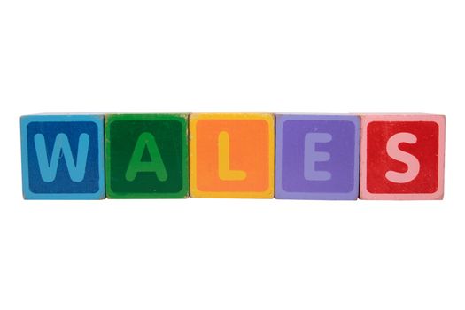 toy letters that spell wales against a white background with clipping path