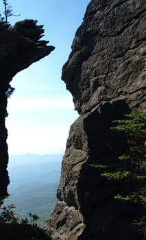 Along the trail at Grandfather mountain in North Carolina, view through the rocks