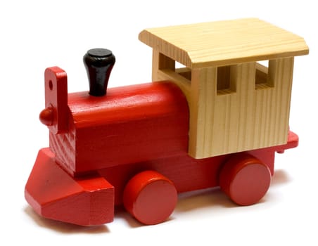 Old vintage wooden toy train on white background