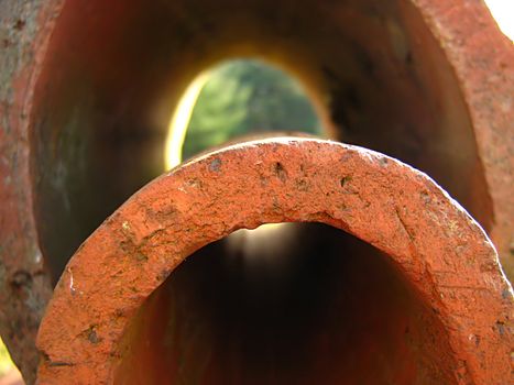 A photograph of clay pipes detailing their shapes and texture.