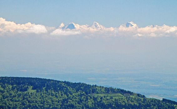 The place in Switzerland Jura calling "Vue des Alpes" , really we can see Alps appeared from clouds, but the impression that there is still Neuchatel Lake and Fribourg plane are below