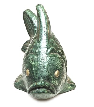 sculpture ceramic fish is isolated on the white