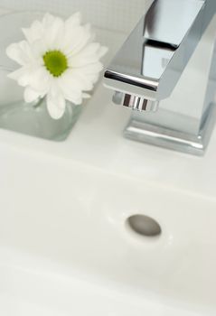 Closeup of modern bathroom tap