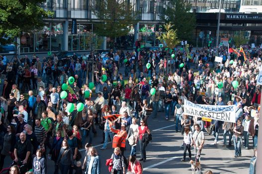 STUTTGART - Oct 09: 150K people protest against the S21 rail project in Stuttgart on Oct 09, 2010 in Stuttgart. S21 station is one of the most expensive and controversial railway projects with regular demonstrations going on. The photo shows the main demonstration with at least 150.000 people participating on a march through the main streets of Stuttgart, ending in a huge event in the Schlosspark.