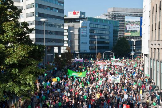 STUTTGART - Oct 09: 150K people protest against the S21 rail project in Stuttgart on Oct 09, 2010 in Stuttgart. S21 station is one of the most expensive and controversial railway projects with regular demonstrations going on. The photo shows the main demonstration with at least 150.000 people participating on a march through the main streets of Stuttgart, ending in a huge event in the Schlosspark.