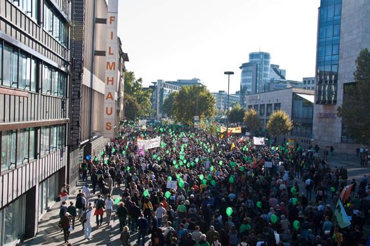 STUTTGART - Oct 09: 150K people protest against the S21 rail project in Stuttgart on Oct 09, 2010 in Stuttgart. S21 station is one of the most expensive and controversial railway projects with regular demonstrations going on. The photo shows the main demonstration with at least 150.000 people participating on a march through the main streets of Stuttgart, ending in a huge event in the Schlosspark.