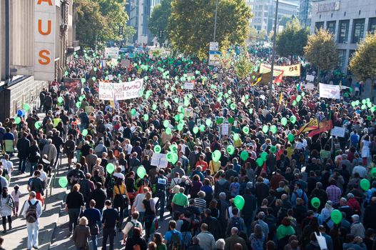 STUTTGART - Oct 09: 150K people protest against the S21 rail project in Stuttgart on Oct 09, 2010 in Stuttgart. S21 station is one of the most expensive and controversial railway projects with regular demonstrations going on. The photo shows the main demonstration with at least 150.000 people participating on a march through the main streets of Stuttgart, ending in a huge event in the Schlosspark.