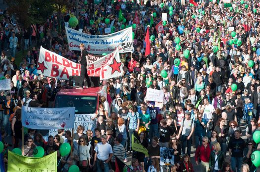 STUTTGART - Oct 09: 150K people protest against the S21 rail project in Stuttgart on Oct 09, 2010 in Stuttgart. S21 station is one of the most expensive and controversial railway projects with regular demonstrations going on. The photo shows the main demonstration with at least 150.000 people participating on a march through the main streets of Stuttgart, ending in a huge event in the Schlosspark.