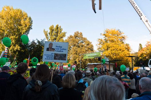STUTTGART - Oct 09: 150K people protest against the S21 rail project in Stuttgart on Oct 09, 2010 in Stuttgart. S21 station is one of the most expensive and controversial railway projects with regular demonstrations going on. The photo shows the final event in the Schlosspark after a demonstration moving through the main streets of Stuttgart with at least 150.000 people.
