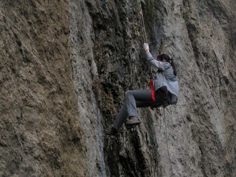 Rock-climbing; people; sports; mountaineering; an extreme; rest; tourism; entertainment