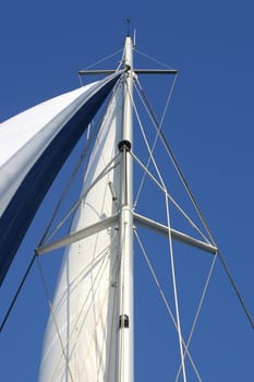 sailing mast on a modern boat and blue sky