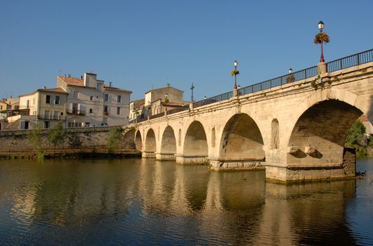 medieval bridge of sommieres, little town in gard, france