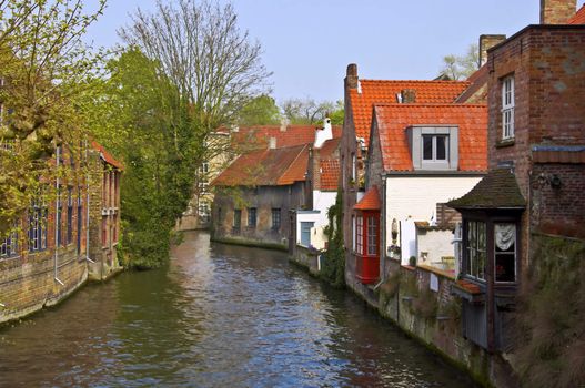 Classic view of channels of Bruges. Belgium. Medieval fairytale city. Summer urban landscape. 