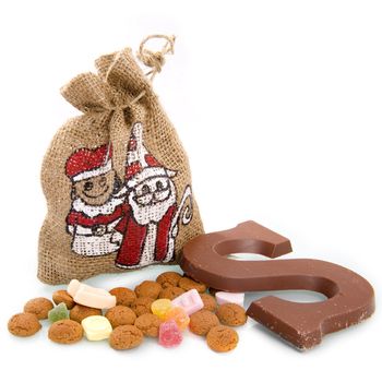 a bag, nuts and a chocolate letter for "sinterklaas", a dutch tradition