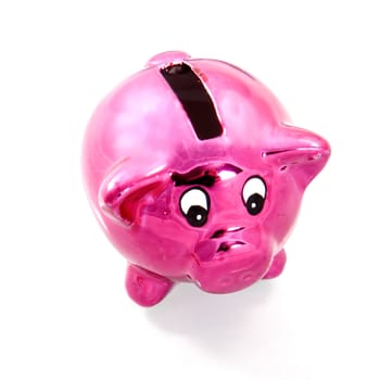 a pink piggybank on a white background