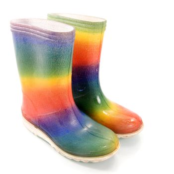 two colorful boots on a white background