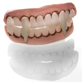 a denture of a vampire on a white background