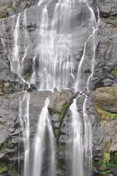 Slow shutter water waterfall background is very beautiful stone