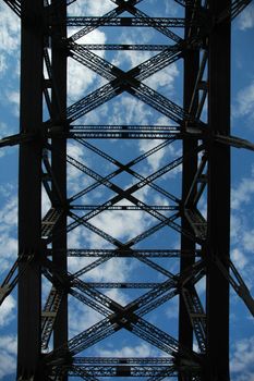 harbour bridge construction detail photo, blue sky with clouds