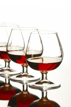 three glasses with brandy