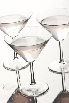 three cocktail glasses with alcohol cocktail