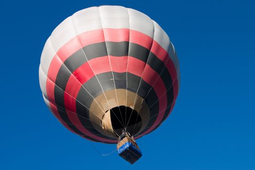 Balloon on a background of the blue sky