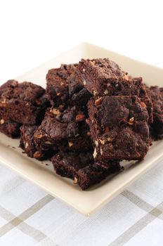 Homemade chocolate brownies served on a plate