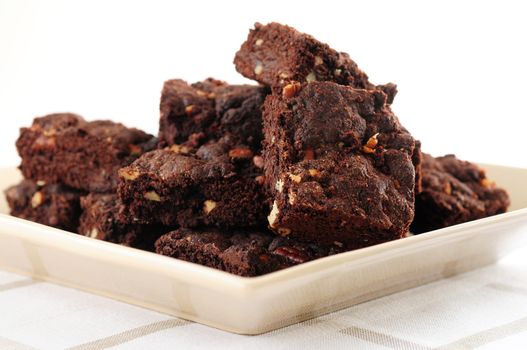 Homemade chocolate brownies served on a plate