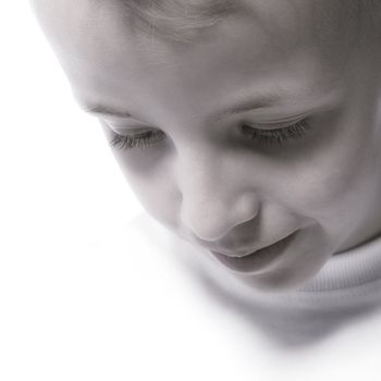 Portrait of a young boy in a dreamy pose