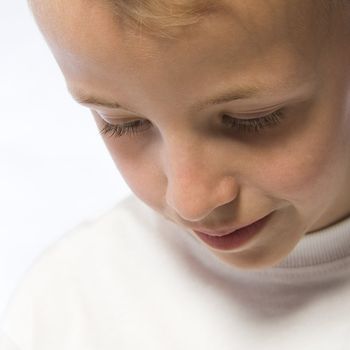 Portrait of a young boy in a dreamy pose