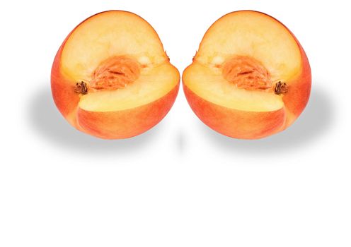 Two  peach cut on slices on a white background