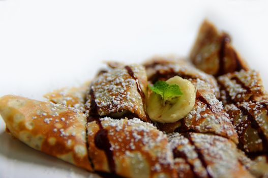 Banana and Chocolate Crepe. High Key shot with shallow depth of field