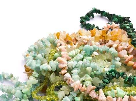 Semiprecious chip stone bead necklaces on white background