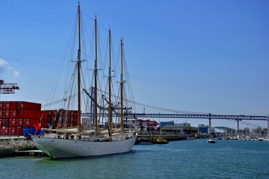 Sailboats, ships in port on the dock