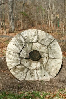 A Old stone wheel for a cannon