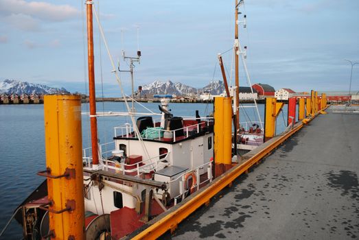 A fishing boat at the docks of Svolvær in Lofoten, Norway.