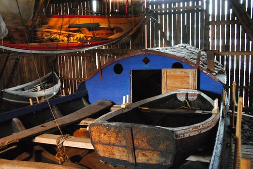 Boats stowed away in a shed in Lofoten, Norway.