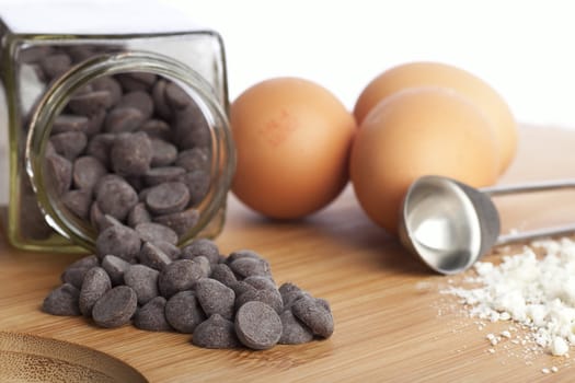 Collection of ingredients for baking chocolate chip cookies.