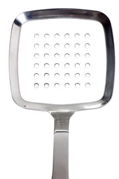 Close up view of kitchen utensil perforated spoon over white background