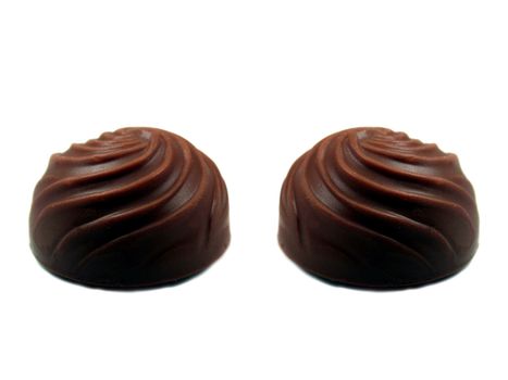 Two  chocolate candy isolated on white background.