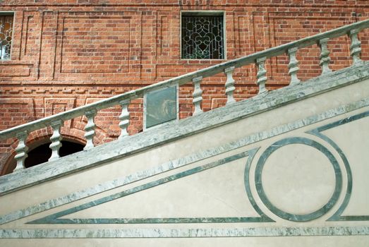 the stairs of the swedish city hall with a great brickwall in the background