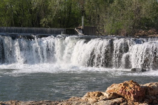 the grand fall with rushing water on to rocks