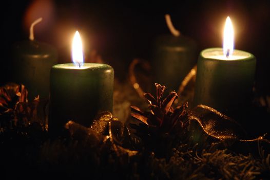 Shot of candles burning on advent wreath