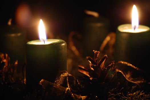 Shot of candles burning on advent wreath