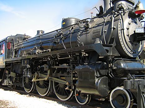 A photograph of an old steam locomotive.