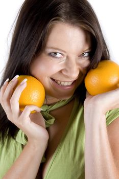 Young girl with fruits on white background