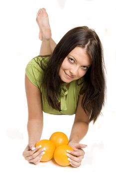 Young girl with fruits on white background