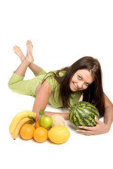 Young girl with fruits on white background
